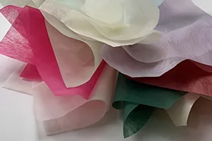 Non-woven fabric made from recycled rPET flakes.